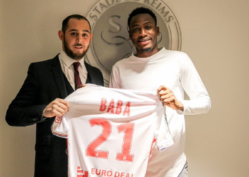 Razak Braimah congratulates Baba Rahman on his Stade Reims move