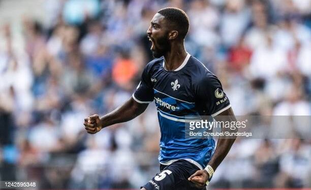 HAMBURG, GERMANY - AUGUST 19:  (EDITORS NOTE: Image has been digitally enhanced.) Patric Pfeiffer of SV Darmstadt 98 celebrates after scoring his team's first goal during the Second Bundesliga match between Hamburger SV and SV Darmstadt 98 at Volksparkstadion on August 19, 2022 in Hamburg, Germany. (Photo by Boris Streubel/Bundesliga/Bundesliga Collection via Getty Images)