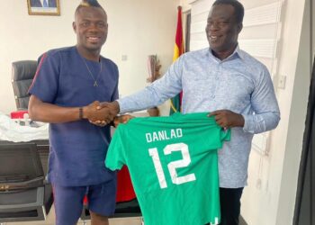 Danlad Ibrahim presents World Cup jersey to Hon. Ignatius Baffour Awuah