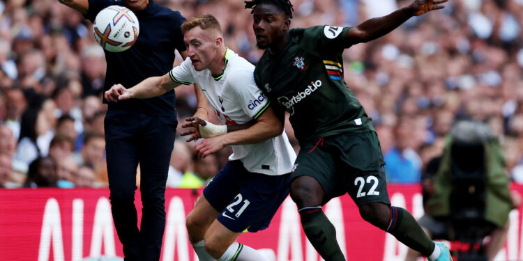 Soccer Football - Premier League - Tottenham Hotspur v Southampton - Tottenham Hotspur Stadium, London, Britain - August 6, 2022 Tottenham Hotspur's Dejan Kulusevski in action with Southampton's Mohammed Salisu as Tottenham Hotspur manager Antonio Conte looks on Action Images via Reuters/Matthew Childs
