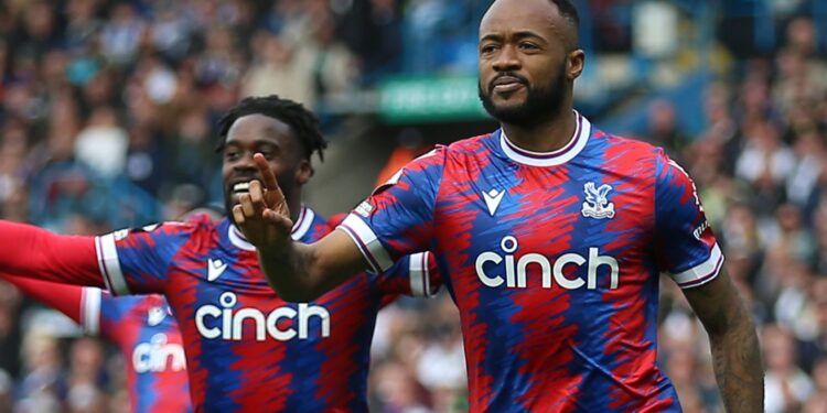 Jeffery Schlupp joins Jordan Ayew in celebrating his second goal against Leeds United