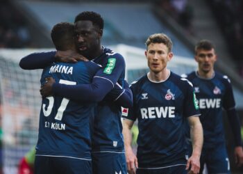 Ghanaian defender Kingsley Schindler reacts to FC Koln victory over Augsburg