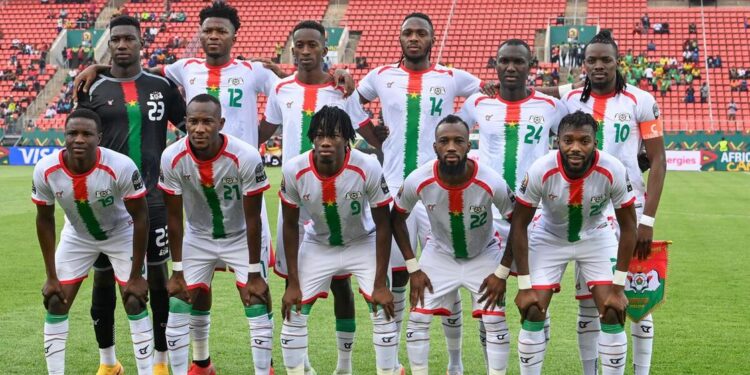 The Burkina Faso team pose for a team photo during the Group A Africa Cup of Nations (CAN) 2021 football match between Burkina Faso and Ethiopia at Stade de Kouekong in Bafoussam on January 17, 2022. (Photo by Pius Utomi EKPEI / AFP) (Photo by PIUS UTOMI EKPEI/AFP via Getty Images)