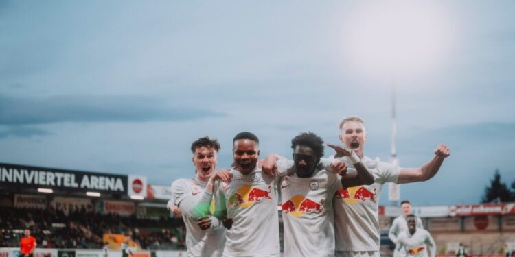 RIED, AUSTRIA - MARCH 15: Luka Reischl (L), Lawrence Agyekum, Moussa Yeo, Raphael Hofer (R) of FC Liefering celebrate during the Admiral 2. Liga Match between SV Ried vs. FC Liefering  at Innviertel Arena on March 15, 2024 in Ried, Austria. Photo by Andreas Schaad - FC Liefering