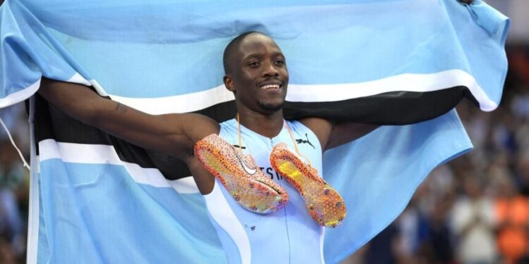 Botswana’s Letsile Tebogo celebrates after winning the men’s 200-meter final at the Paris 2024 Olympics in Saint-Denis on Thursday. | Photo Credit: AP
