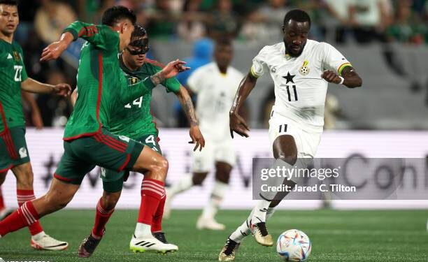CHARLOTTE, NORTH CAROLINA - OCTOBER 14: Elisha Owusu #11 of Ghana dribbles the ball during the first half of their match against México at Bank of America Stadium on October 14, 2023 in Charlotte, North Carolina.  (Photo by Jared C. Tilton/Getty Images)