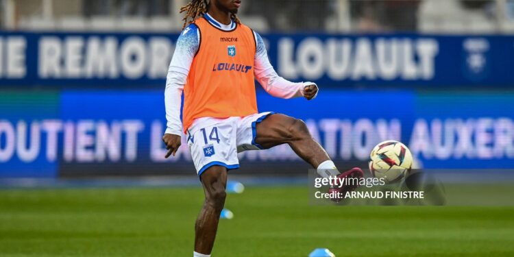 Auxerre's Ghanaian defender Gideon Mensah warms up prior to the French L1 football match between AJ Auxerre and Stade Rennais at Stade de l'Abbe-Deschamps in Auxerre, central France on March 11, 2023. (Photo by ARNAUD FINISTRE / AFP) (Photo by ARNAUD FINISTRE/AFP via Getty Images)