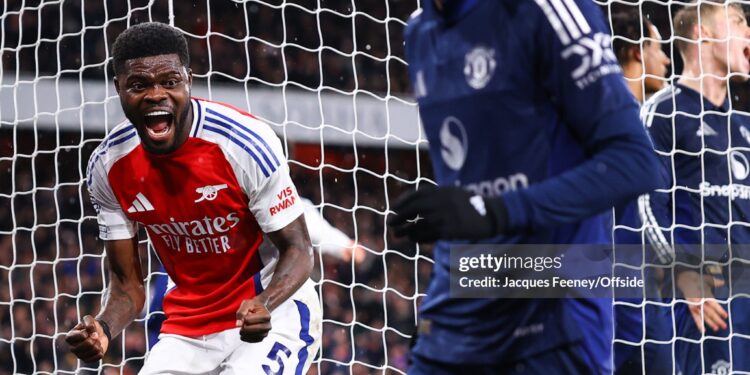 LONDON, ENGLAND - DECEMBER 3: Thomas Partey of Arsenal celebrates their second goal scored by Saliba during the Premier League match between Arsenal FC and Manchester United FC at Emirates Stadium on December 3, 2024 in London, England. (Photo by Jacques Feeney/Offside/Offside via Getty Images)