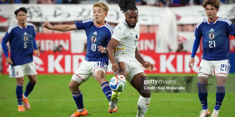 TOYOTA, JAPAN - NOVEMBER 14: Ritsu Doan of Japan (L) and Antoine Semenyo of Ghana (R) compete for the ball during the international friendly match between Japan and Ghana at Toyota Stadium on November 14, 2025 in Toyota, Aichi, Japan. (Photo by Koji Watanabe/Getty Images)